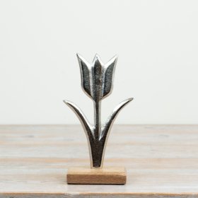 a sleek and radiant silver flower decorative piece