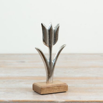 Elegant aluminium tulip flower on a natural wood base inspired by the beauty of nature