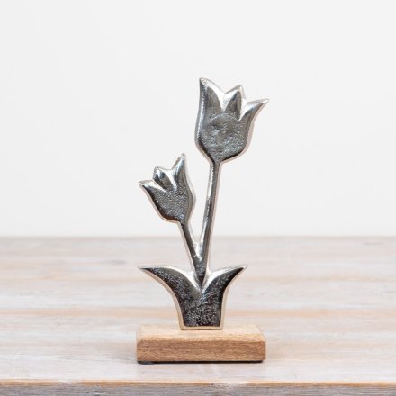a charming silver flower ornamnet 