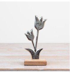 a charming silver flower ornamnet 