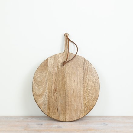 a charming round padel board chopping board 