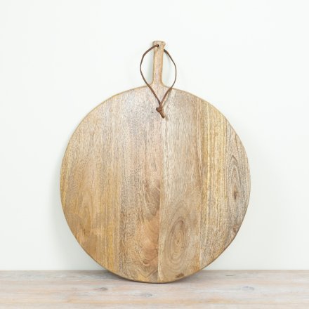 Natural wood chopping board with rustic charm and handy leather loop for easy storage