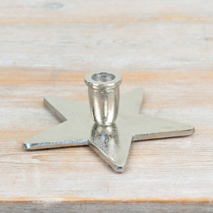 a charming star shaped candle holder perfect fro taper candles 