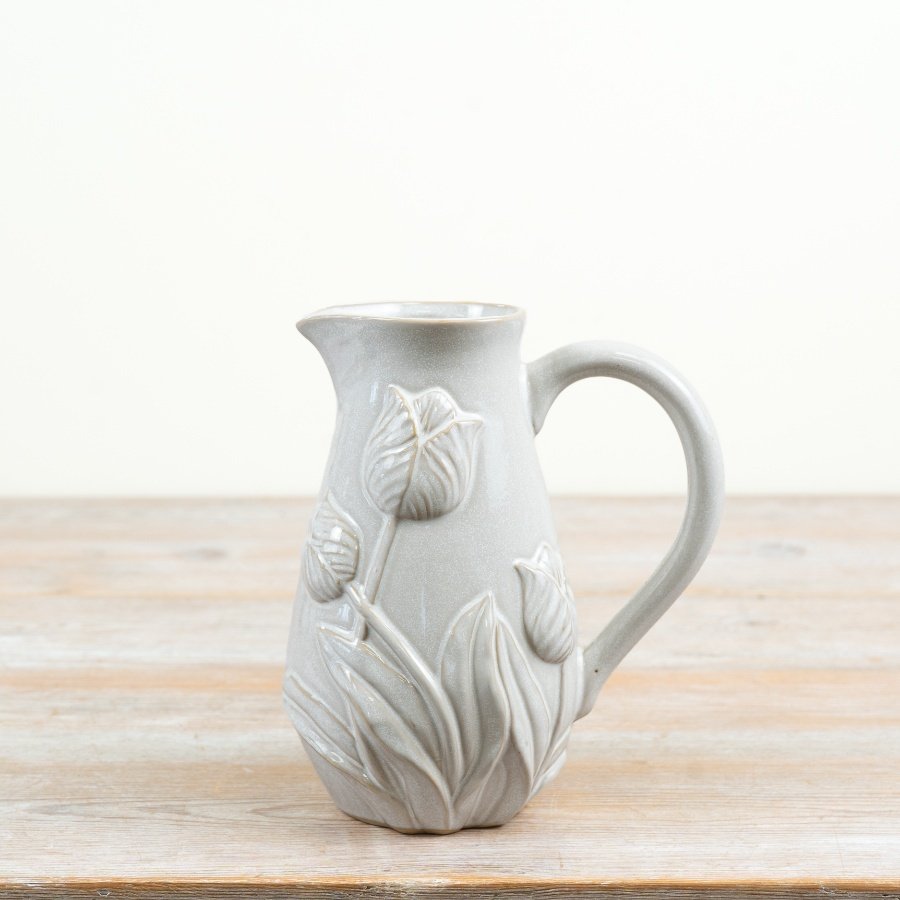 Charming whitewashed jug embellished with delicate tulip designs