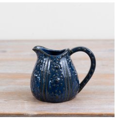a delightful blue jug with textured finish