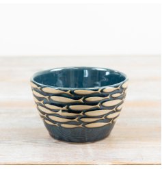 Delight in coastal charm with this elegant blue porcelain bowl adorned with a shoal of fish design