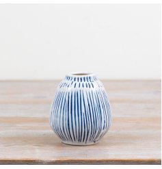 Delightful blue and white mini bud vase with intricate patterning