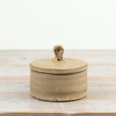 an elegant storage container with a smooth, tactile surface