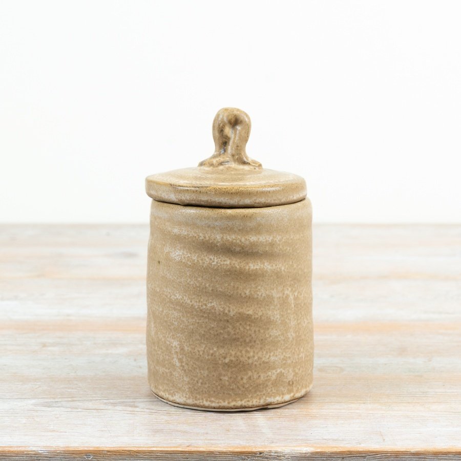 sleek storage pot with natural glazed finish