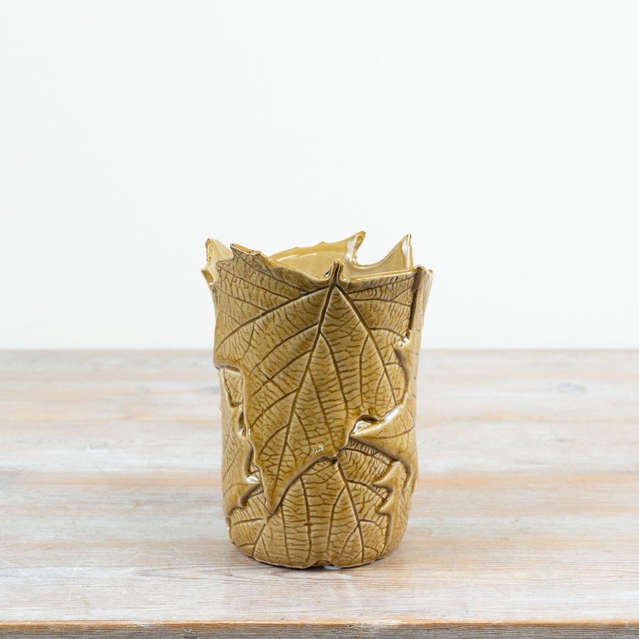 Brighten your blooms with this elegant olive green leaf patterned vase