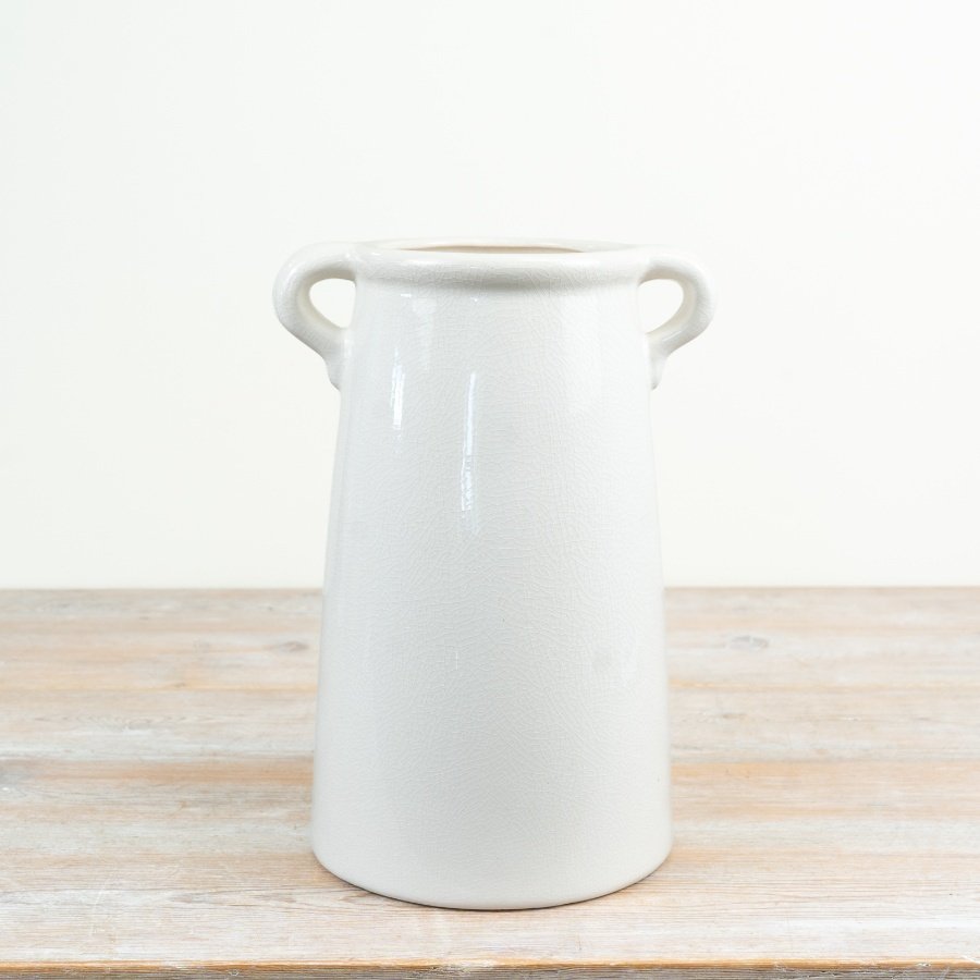 a glossy vase featuring elegant handles, ideal for floral displays