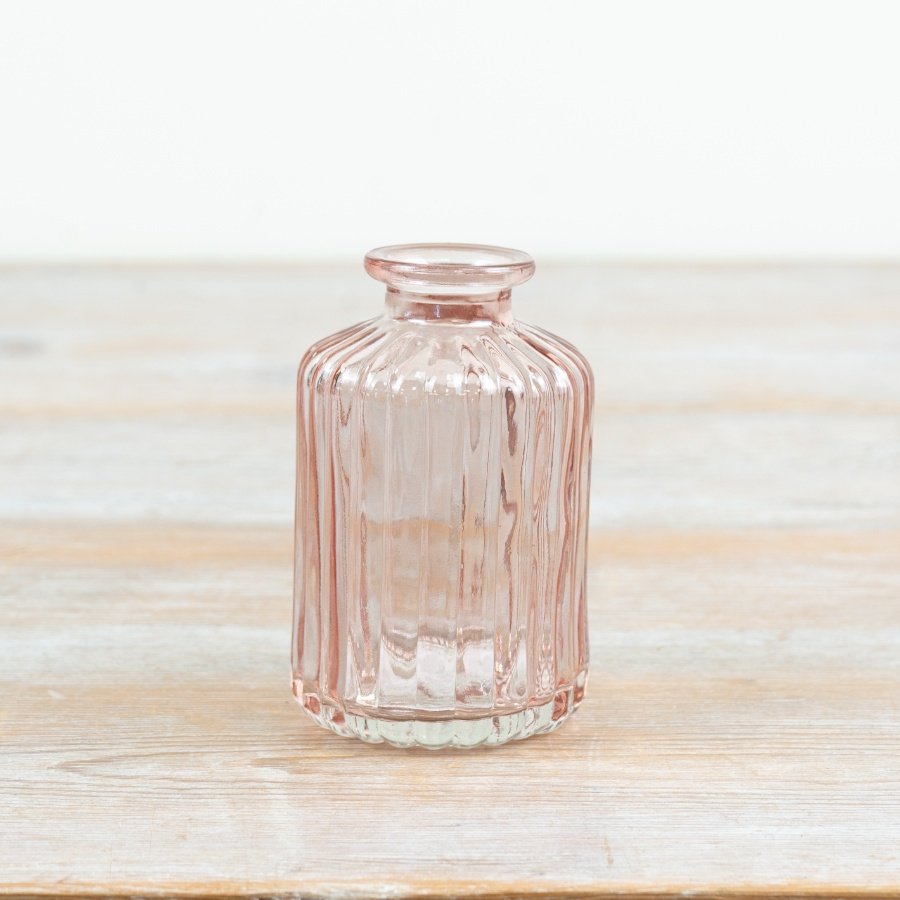 a delightful pastel vase with a hand-painted flourish