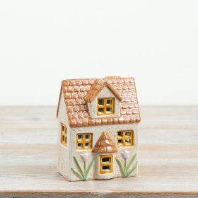 glossy grey ceramic house with charming floral details and soft internal LED lighting