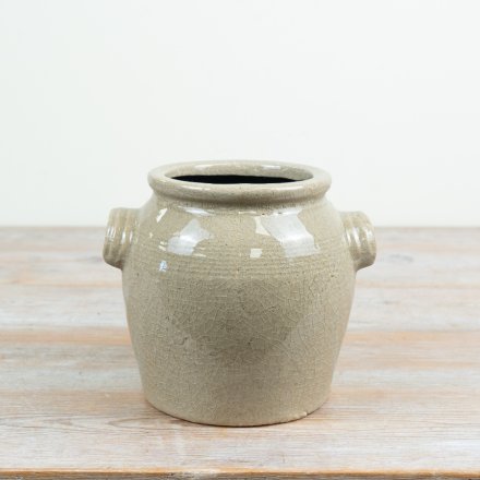 a charming farmhouse looking flower pot 