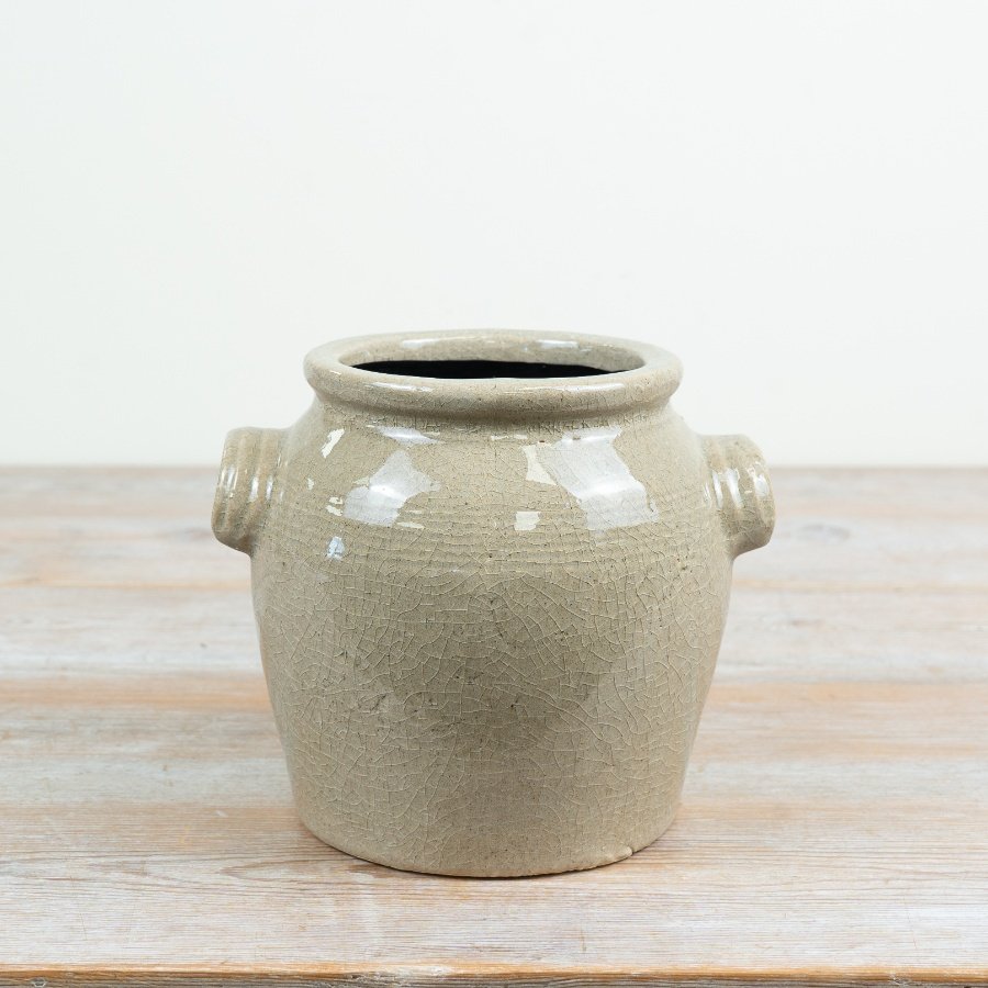 a delightful flower pot with a classic farmhouse feel