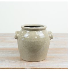 a charming farmhouse looking flower pot 