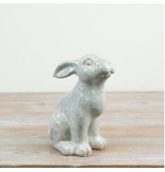 This rabbit deco has a lifelike sitting position with an expressive gaze, making it a wonderful conversation piece.
