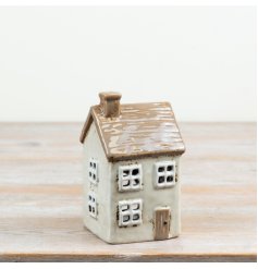 A delightful rustic cottage-style candle holder to warm your home