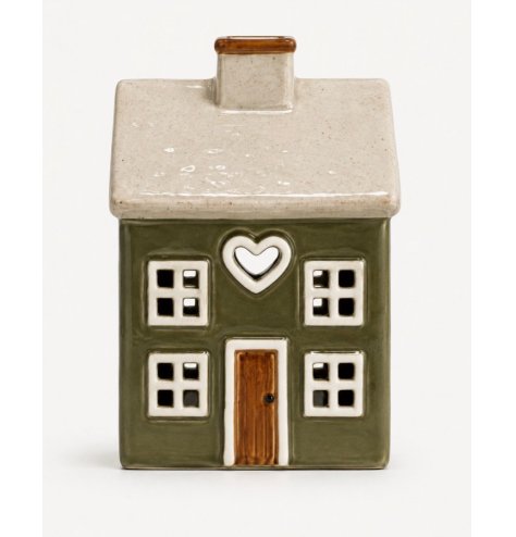 delightful cottage-shaped tea light holder that adds warmth to your home