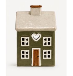 delightful tea light holder featuring a quaint cottage motif