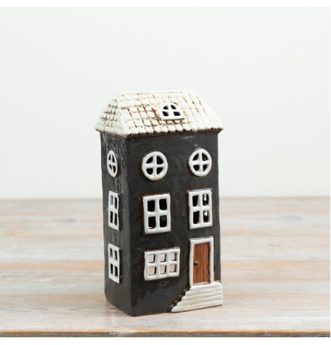 Add a cosy Nordic touch to your home with this charming tea light cottage holder