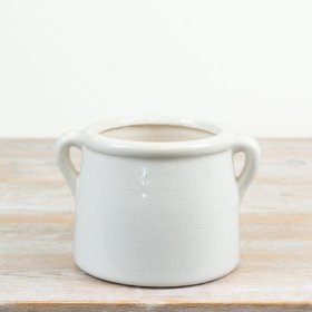 elegant white planter pot with convenient side handles for easy movement