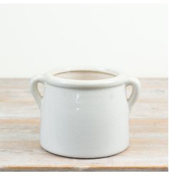 sleek bright white indoor planter with stylish side handles