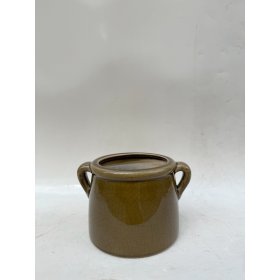 A glossy, deep green planter with practical handles for effortless style