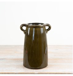 a charming vase  coated in a high-gloss, deep olive green 