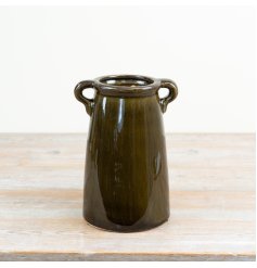 a charming deep green vase with handles 