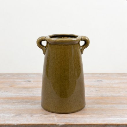 a charming deep green vase with handles 