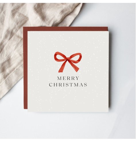 Spread Christmas joy with this sophisticated bow-themed greeting card