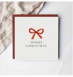 Send festive cheer with this elegant Merry Christmas bow card