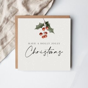Share heartfelt festive greetings with this delightful holly-inspired Christmas card