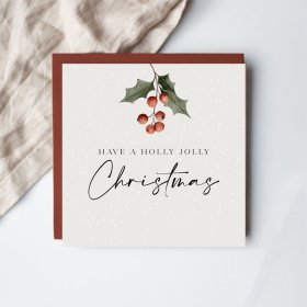 Share heartfelt festive greetings with this delightful holly-inspired Christmas card