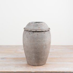 Elegant terracotta vase with a natural finish to enhance any room