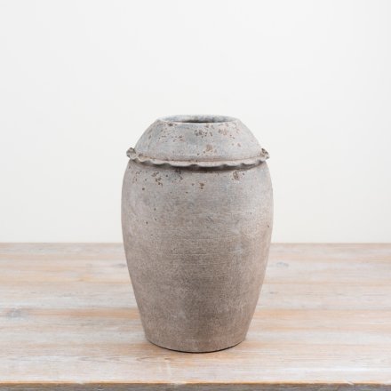 Timeless terracotta vase with a refined finish to elevate any space