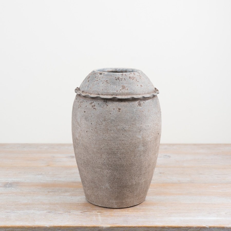 Elegant terracotta vase with a natural finish to enhance any room