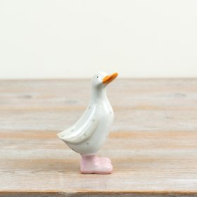 delightful glazed duck figurine with polka dots and bright orange beak