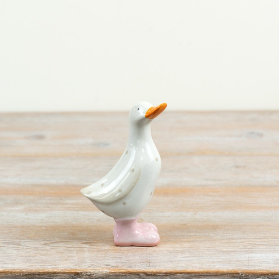 delightful glazed duck figurine with polka dots and bright orange beak