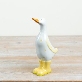 Bring a playful and whimsical vibe to your home with this delightful duck decoration