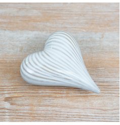 Delicate porcelain heart ornament perfect for adding warmth to your home