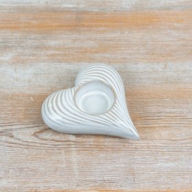 Elegant heart motif candle holder to add warmth and charm