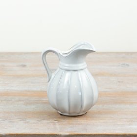 Chic ribbed ceramic jug ideal for serving drinks or displaying blooms