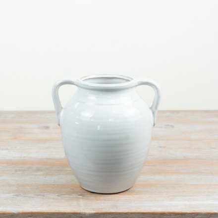 a charming urn style vase with stunning handles 