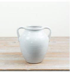 a charming urn style vase with stunning handles 