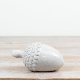 Elegant ceramic pinecone brings a cosy, woodland-inspired charm to your living space