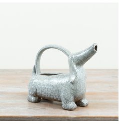 Charming white ceramic sausage dog watering can to enhance your garden or indoor plants
