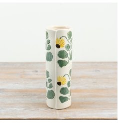 elegant tall vase adorned with bright sunflowers and lush green foliage ideal for any floral display