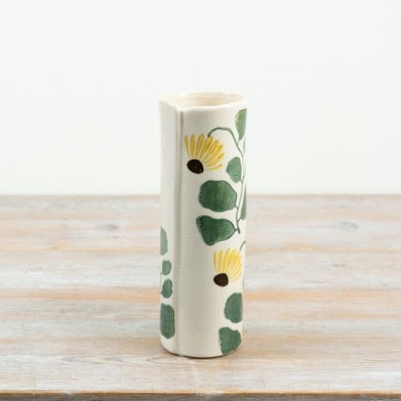 Infuse your space with nature’s charm using this delightful yellow and green ceramic vase